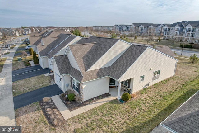 drone / aerial view with a residential view