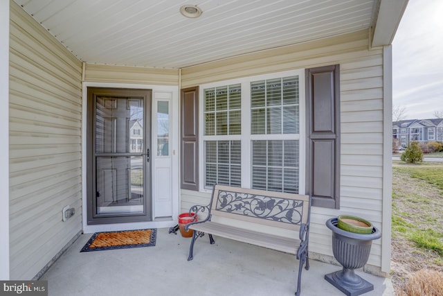 property entrance featuring a porch