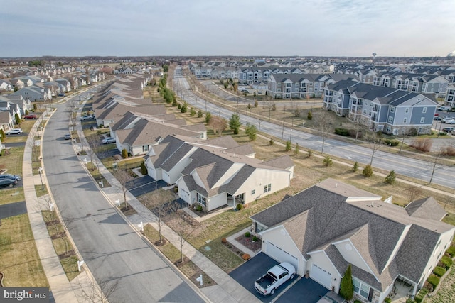 birds eye view of property with a residential view