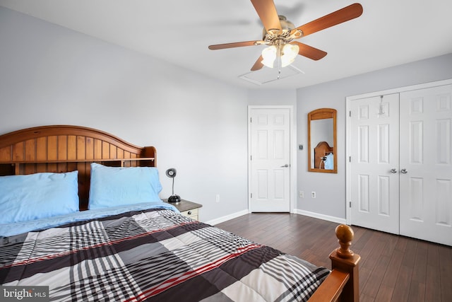 bedroom with a closet, baseboards, wood-type flooring, and ceiling fan