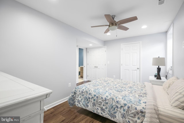 bedroom featuring recessed lighting, visible vents, baseboards, and dark wood finished floors