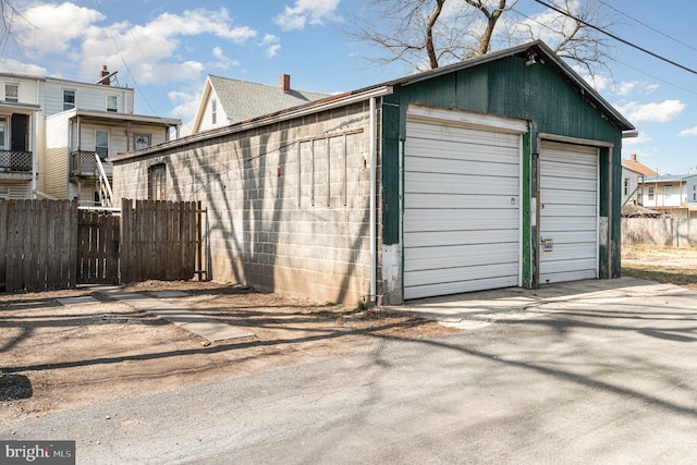 garage featuring fence