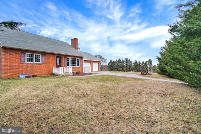 exterior space with a garage and driveway