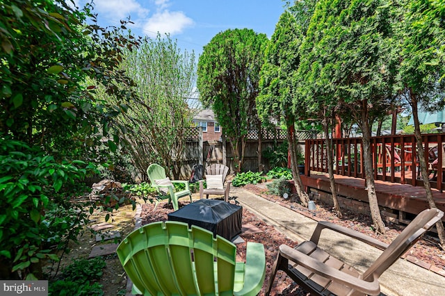 view of patio / terrace featuring fence