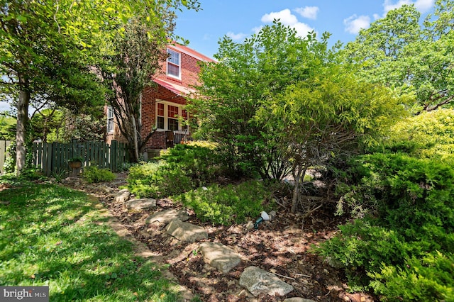 view of yard with fence