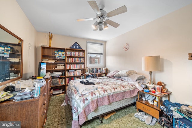 bedroom featuring a ceiling fan and carpet flooring