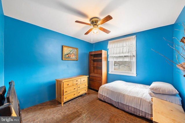 bedroom featuring ceiling fan