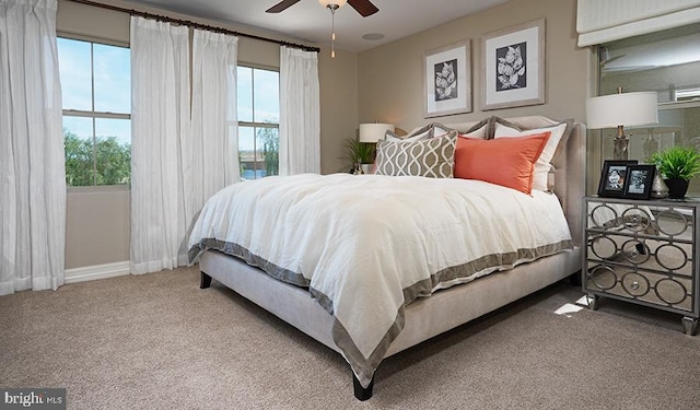 carpeted bedroom featuring a ceiling fan