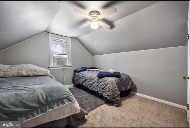 bedroom with vaulted ceiling, a ceiling fan, baseboards, and carpet floors