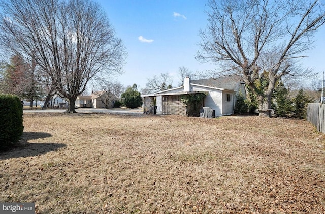 view of yard with fence