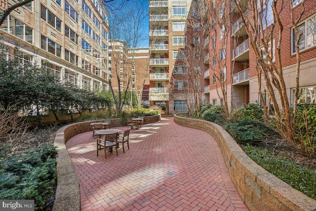 view of property's community featuring a patio