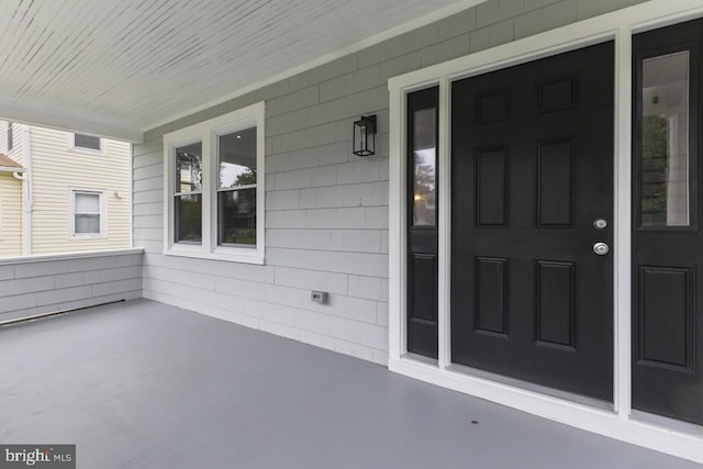 entrance to property with covered porch