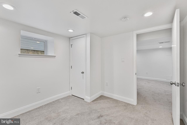 interior space with recessed lighting, visible vents, and baseboards