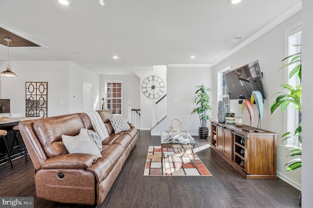 living area with dark wood finished floors, recessed lighting, and baseboards