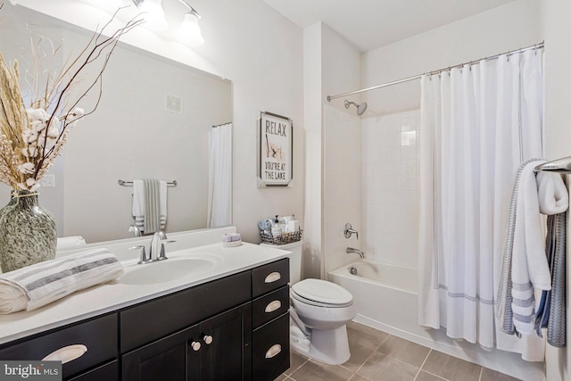 bathroom with tile patterned floors, visible vents, toilet, shower / bath combo, and vanity