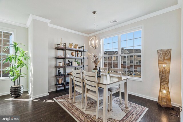 dining space featuring a chandelier, visible vents, dark wood finished floors, and baseboards