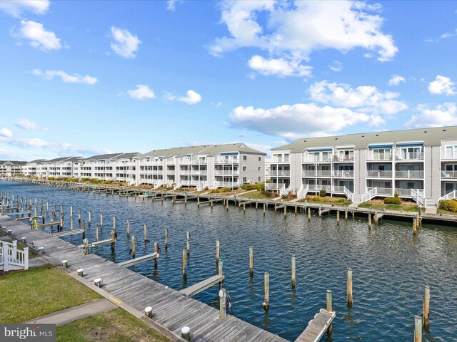 dock area featuring a water view