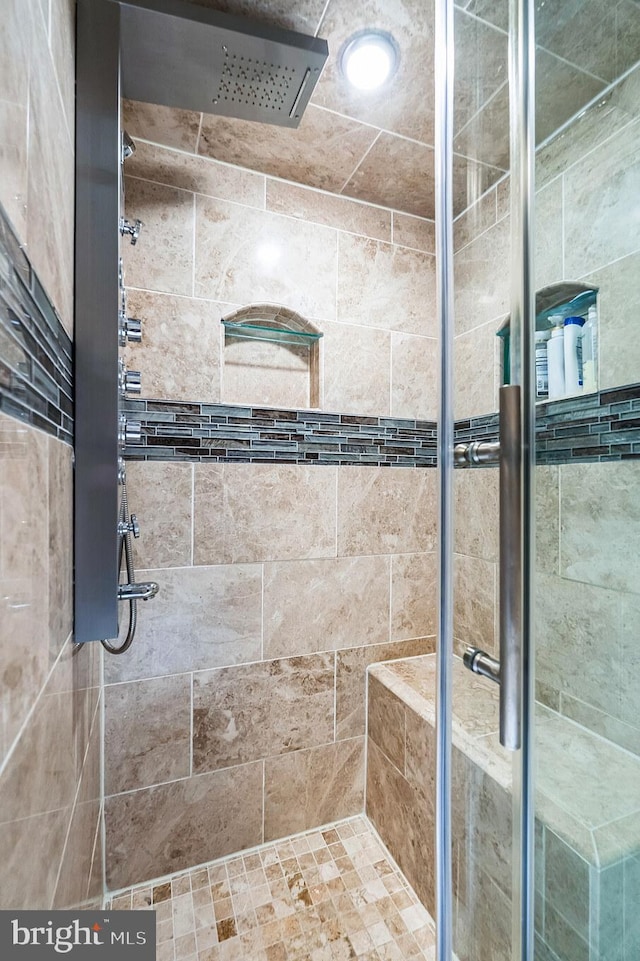 full bathroom with a stall shower