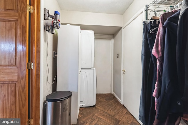 interior space featuring stacked washer and dryer