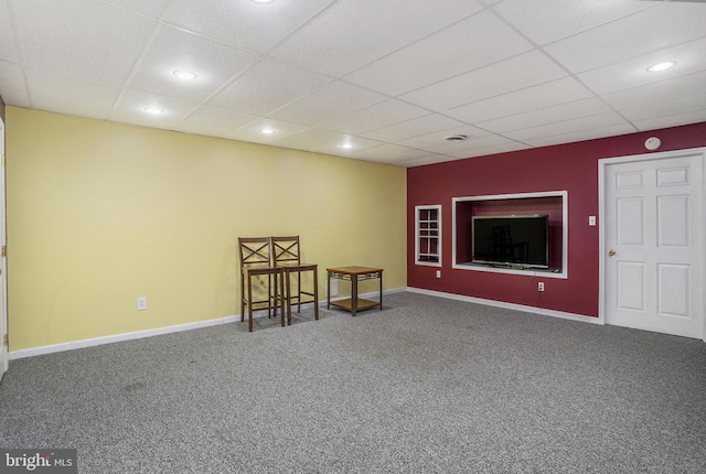 interior space with recessed lighting, a paneled ceiling, baseboards, and carpet floors