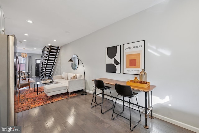 interior space featuring stairs, recessed lighting, wood finished floors, and baseboards