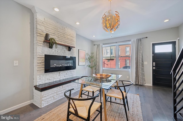 dining area with dark wood finished floors, recessed lighting, and baseboards