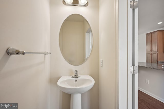 bathroom with wood finished floors