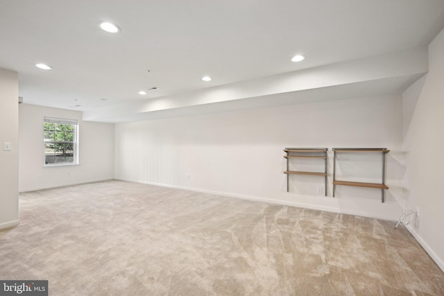 carpeted empty room with recessed lighting and baseboards