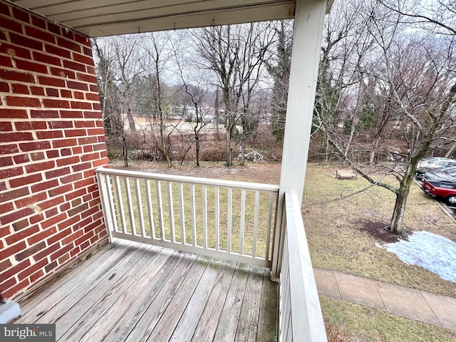 wooden terrace featuring a porch