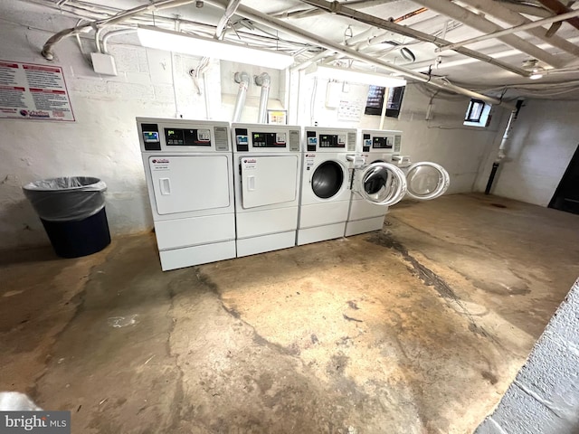 shared laundry area featuring washing machine and dryer