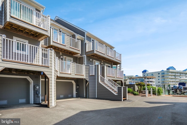 415 14th St Unit 55A, Ocean City, MD 21842 - view of building exterior with a garage and driveway