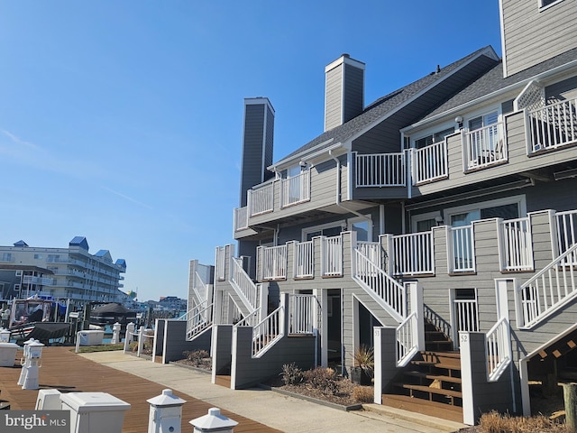 view of property featuring stairs