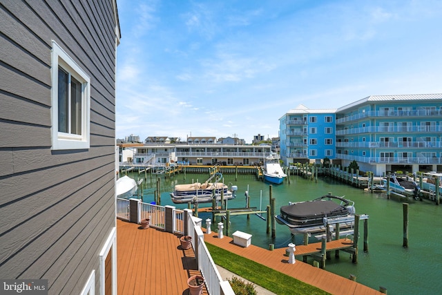 415 14th St Unit 55A, Ocean City, MD 21842 - dock featuring boat lift and a water view
