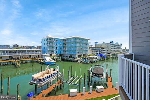 415 14th St Unit 55A, Ocean City, MD 21842 - dock featuring boat lift and a water view