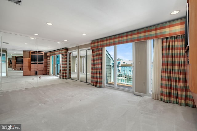 415 14th St Unit 55A, Ocean City, MD 21842 - unfurnished living room with carpet flooring and recessed lighting