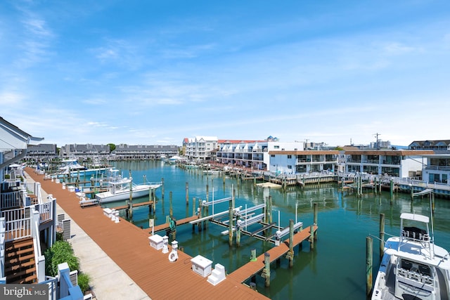 415 14th St Unit 55A, Ocean City, MD 21842 - dock featuring boat lift, view of marina, and a water view