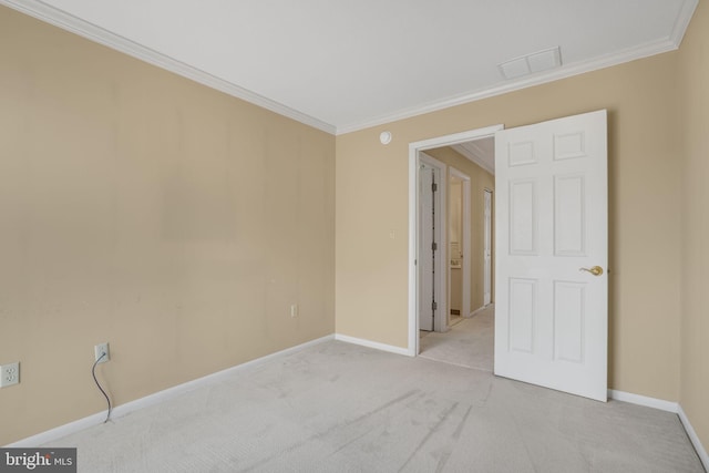 415 14th St Unit 55A, Ocean City, MD 21842 - spare room featuring crown molding, baseboards, and light colored carpet