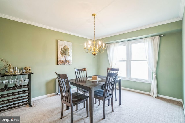 carpeted dining area with a chandelier, crown molding, and baseboards