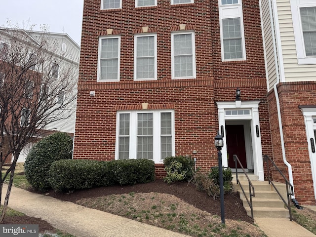 view of front of property with brick siding