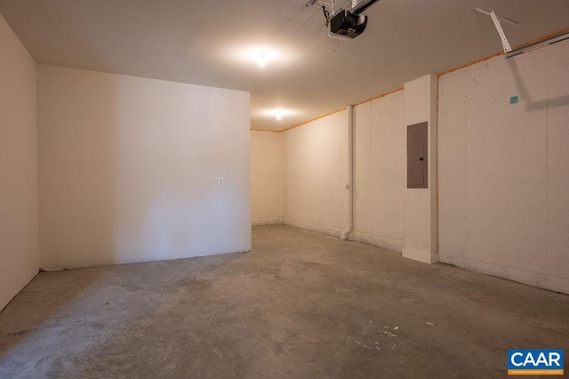 interior space with electric panel and a garage