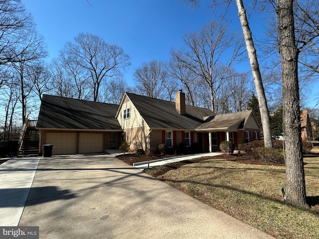 cape cod house with brick siding, a chimney, concrete driveway, and a garage