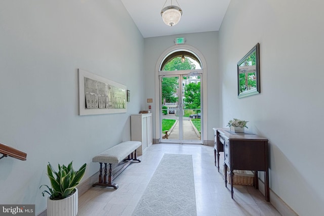 foyer entrance with baseboards