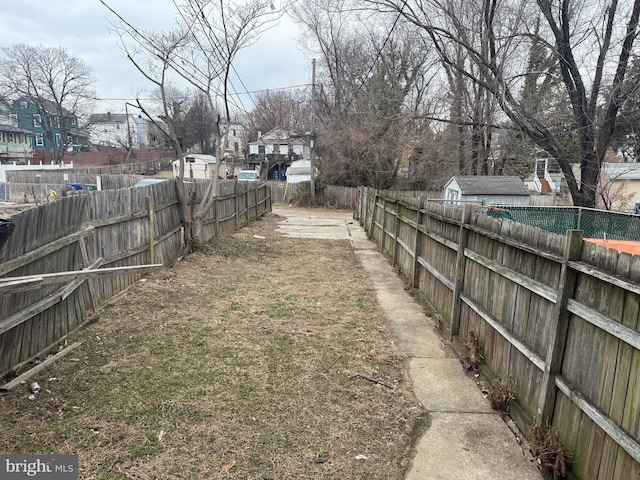 view of yard featuring fence