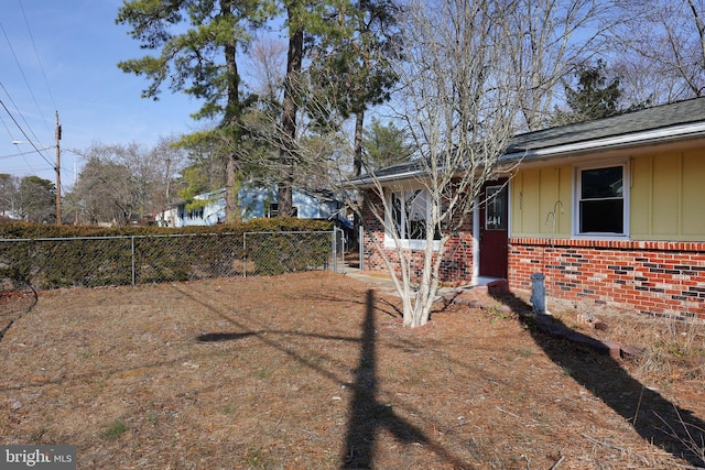 view of yard with fence