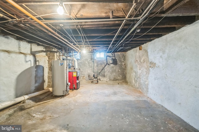 basement with water heater and a heating unit