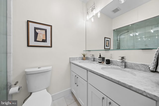 full bathroom featuring tile patterned floors, toilet, visible vents, and a sink