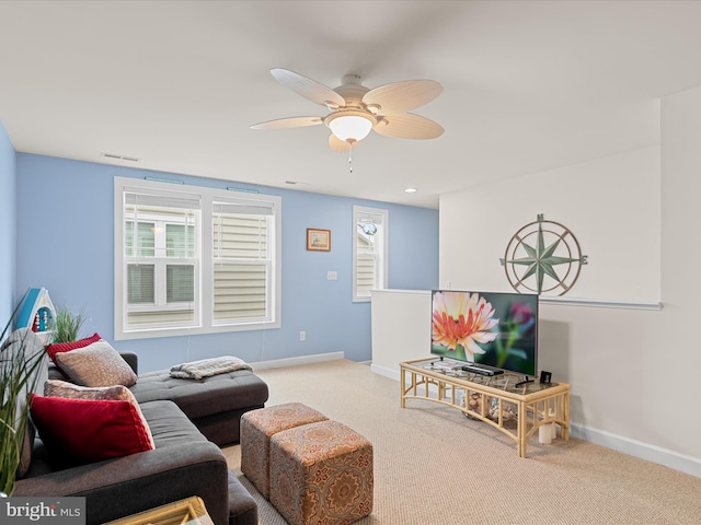 23811 Pembroke Ln, Millville, DE 19967 - carpeted living area with visible vents, baseboards, and ceiling fan
