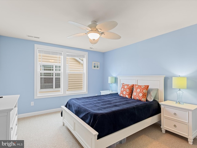 23811 Pembroke Ln, Millville, DE 19967 - bedroom featuring light colored carpet, baseboards, a ceiling fan, and visible vents
