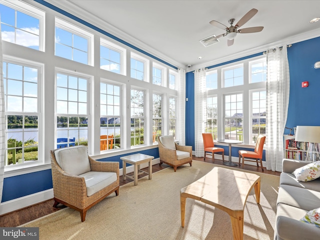 23811 Pembroke Ln, Millville, DE 19967 - sunroom / solarium with a wealth of natural light, visible vents, a water view, and crown molding