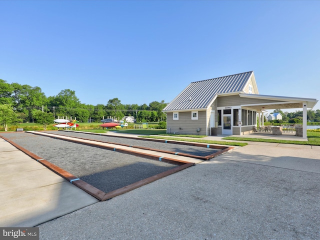 23811 Pembroke Ln, Millville, DE 19967 - view of community with a patio and a lawn